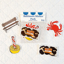 Load image into Gallery viewer, Collection of stickers including a bench, cookies, a lemon with a peppermint stick, and a crab.